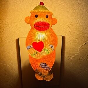 Seasons of Cannon Falls Sock Monkey Plug-In Night Light | Red  Heart | Works
